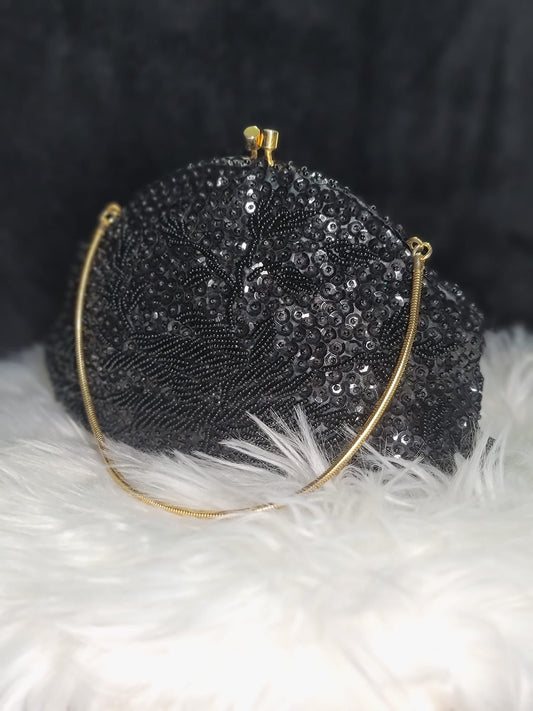 Sequined black clutch purse